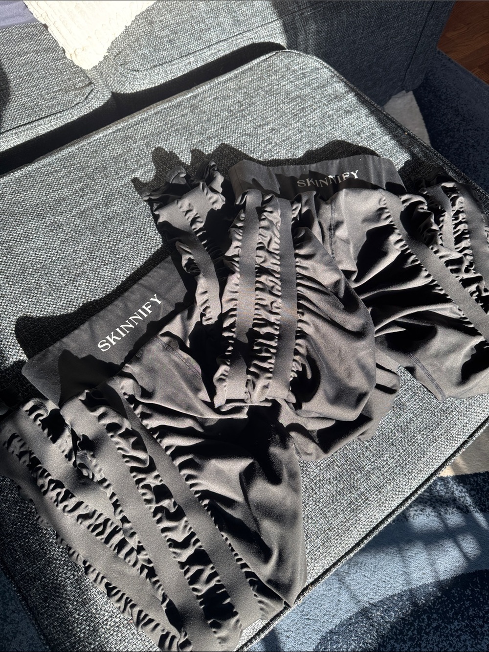 2 pair of SKINNIFY Resistance Band Leggings